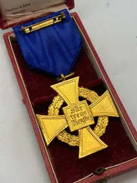 Original medalje for 40 års tro tjeneste med æske