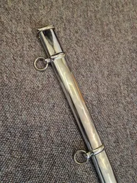 Fin velholdt dansk sabel M/1950 med fæste af forsølvet  tombak.
Skede er forkromet stål