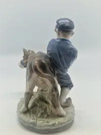Royal Copenhagen Dreng Med Kalv Figur Nr. 772
Designer Christian Thomsen