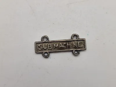 Original amerikansk badge for submachine gun - ww2