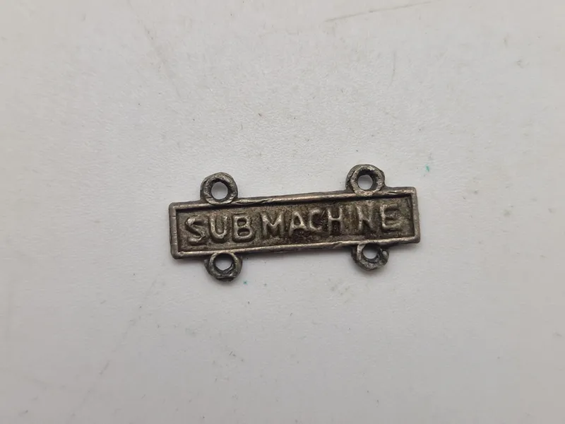 Original amerikansk badge for submachine gun - ww2