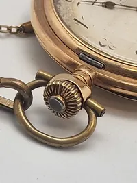 Originalt dobbeltkapslet lommeur af 14 karat guld - jubilæumsgave fra Brandts klædefabrik i Odense vægt inklusiv forgyldt kæde 107,2 gram