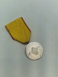 Original æresmedalje fra forsvarets brevdue flyvning “Sølv”