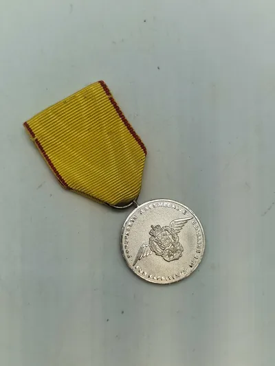 Original æresmedalje fra forsvarets brevdue flyvning “Sølv”