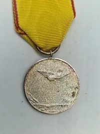 Original æresmedalje fra forsvarets brevdue flyvning “Sølv”