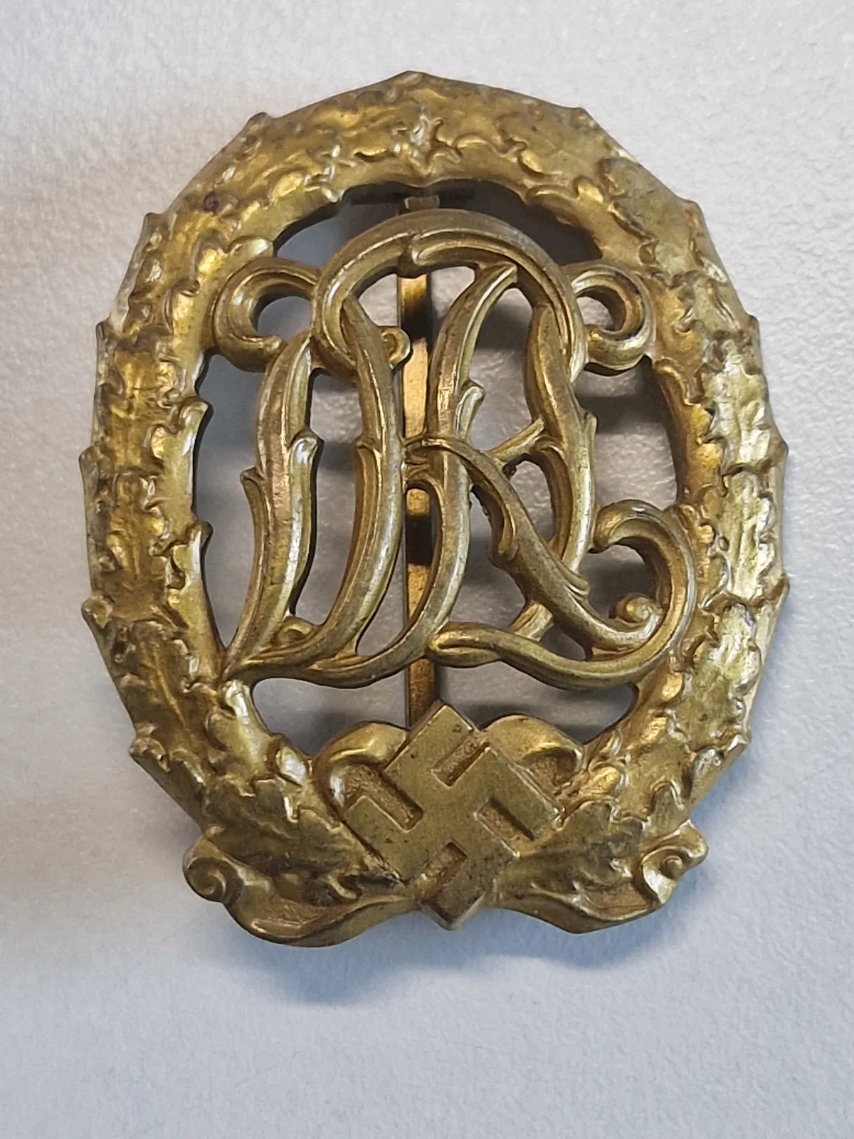 Originalt Deutsches Reichssportabzeichen (DRL) Gold - med fremstiller