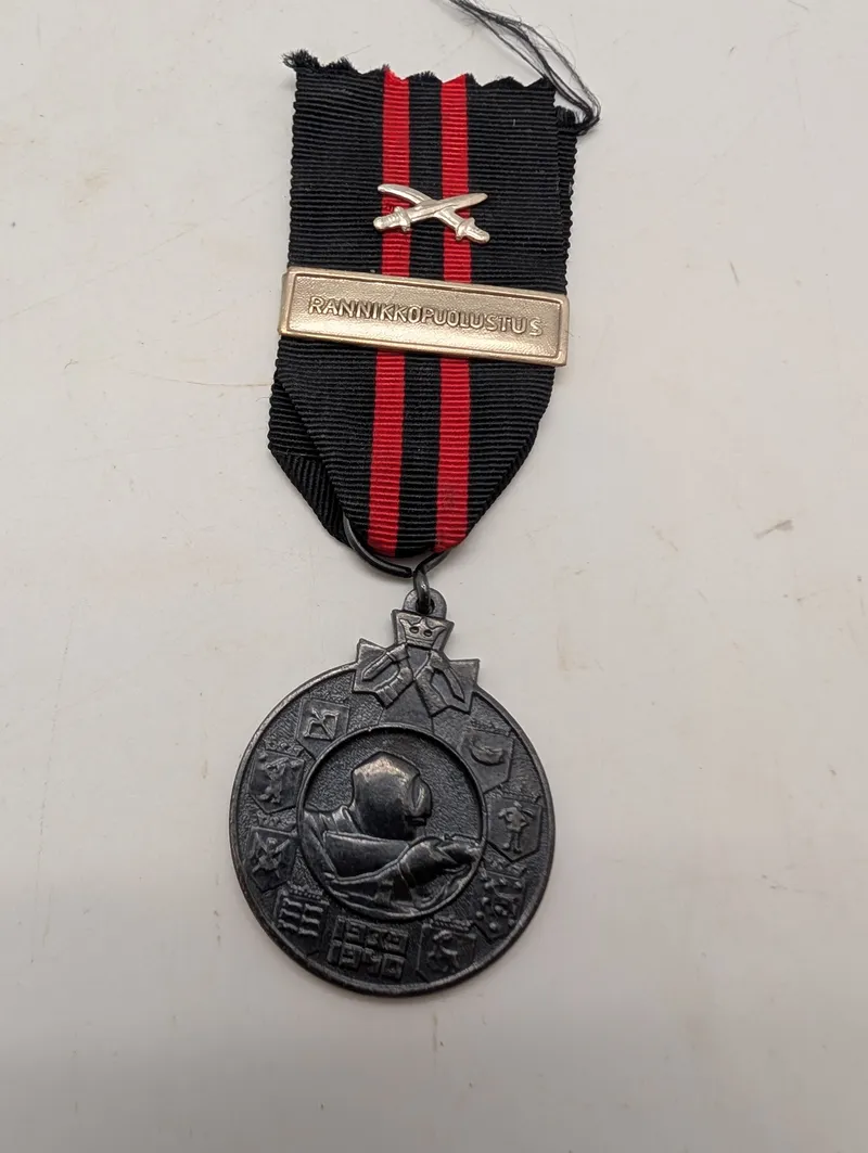 Finsk Vinterkrigs Mindemedalje 1939-1940 med Rannikkopuolustus Spænde
