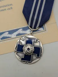 Finsk Lotta Svärd fortjenstmedalje med tilhørende diplom