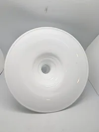 Mythos pendlen fra Holmegaard er designet af Sidse Werner. Glasskærmen er udført i opal hvid. 