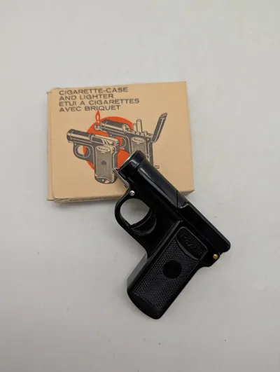 Razzia pistolformet cigaretetui og lighter med original æske