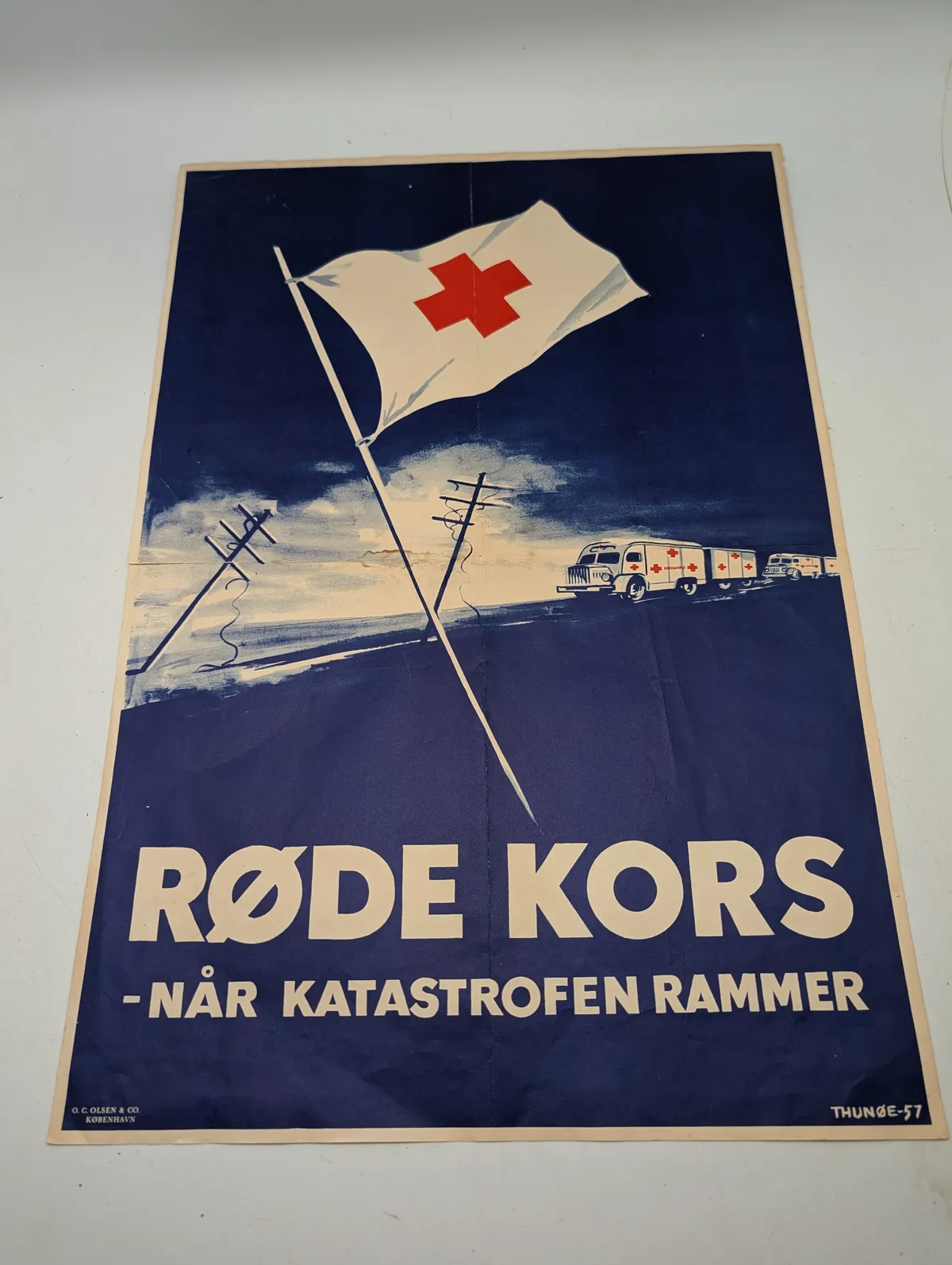 Thunøe-57, Dansk Røde Kors plakat, "Når katastrofen rammer"