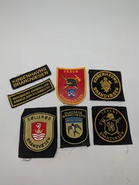 Samling af 7 danske brandvæsen- og ambulance-stofmærker