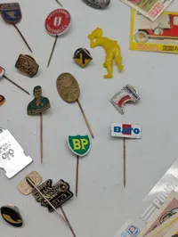 Vintage Collection of Advertising Lapel Pins and Spar Matchbox Labels