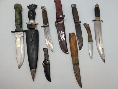 Collection of Eight Vintage Fixed Blade and Folding Knives