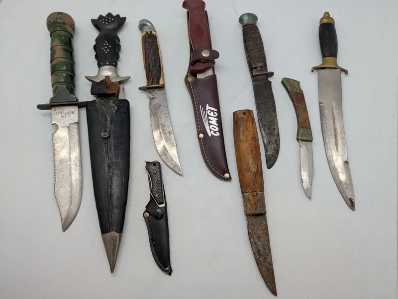 Collection of Eight Vintage Fixed Blade and Folding Knives