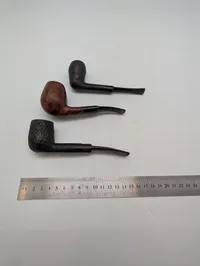 Sæt med tre vintage piber herunder Stanwell briar piber