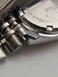 Samling af vintage smykker og Pulsar dameur