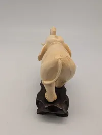 Vintage Carved Faux-Ivory Elephant Figurine on Wooden Stand