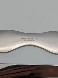 Georg Jensen og Royal Copenhagen brevåbner og flaskeåbner i rustfrit stål