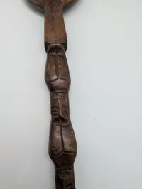 Collection of Four Hand-Carved African Ebony Wood Sculptures and Utensil