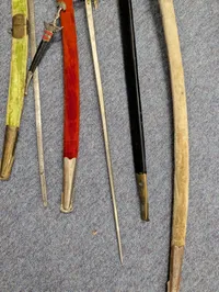 Collection of Nine Assorted Ceremonial Swords, Sabers, and Daggers