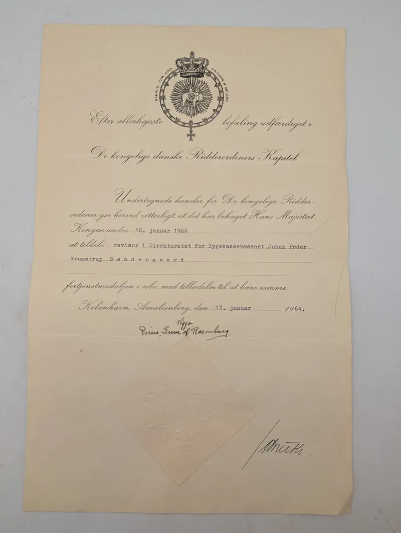 Dansk tildelingsbevis for Fortjenstmedaljen i sølv, 1964