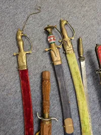 Collection of Nine Assorted Ceremonial Swords, Sabers, and Daggers