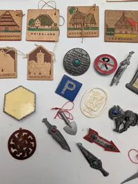 Collection of Vintage German Winterhilfswerk (WHW) Donation Tokens