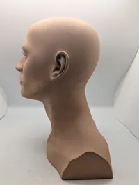 Realistisk mandlig mannequin-hoved i plast med øjne