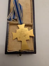 C. E. Juncker, Berlin: Moderkors i guld (Ehrenkreuz der Deutschen Mutter)