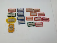 Samling af 15 broderede militære distinktioner og stofmærker DDR mm. 