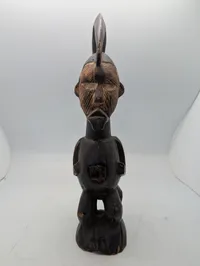 West African Hand-Carved Janus-Faced Wooden Figural Sculpture