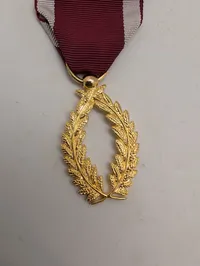 Guldtonet laurbærkrans-medalje med rød-hvidt ordensbånd Belgien 