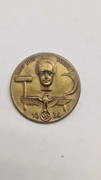 1934 German Tag der Arbeit Tinnie Badge — Bronze-Finished Steel, RK Maker Mark