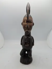 West African Hand-Carved Janus-Faced Wooden Figural Sculpture