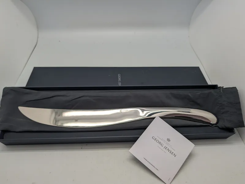 Georg Jensen Indulgence champagnesabel designet af Helle Damkjær