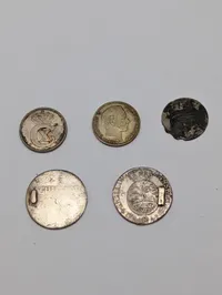 Samling af danske og norske sølvmønter, herunder 25 Øre og Christian VII