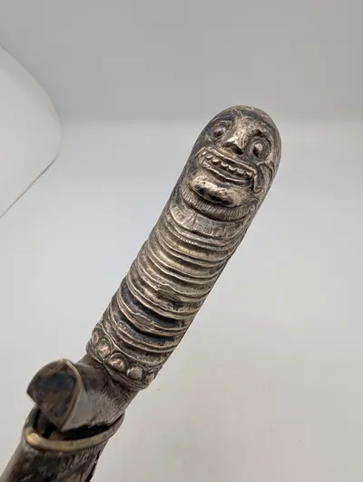 Antique Southeast Asian Silver-Toned Kris Hilt with Anthropomorphic Face