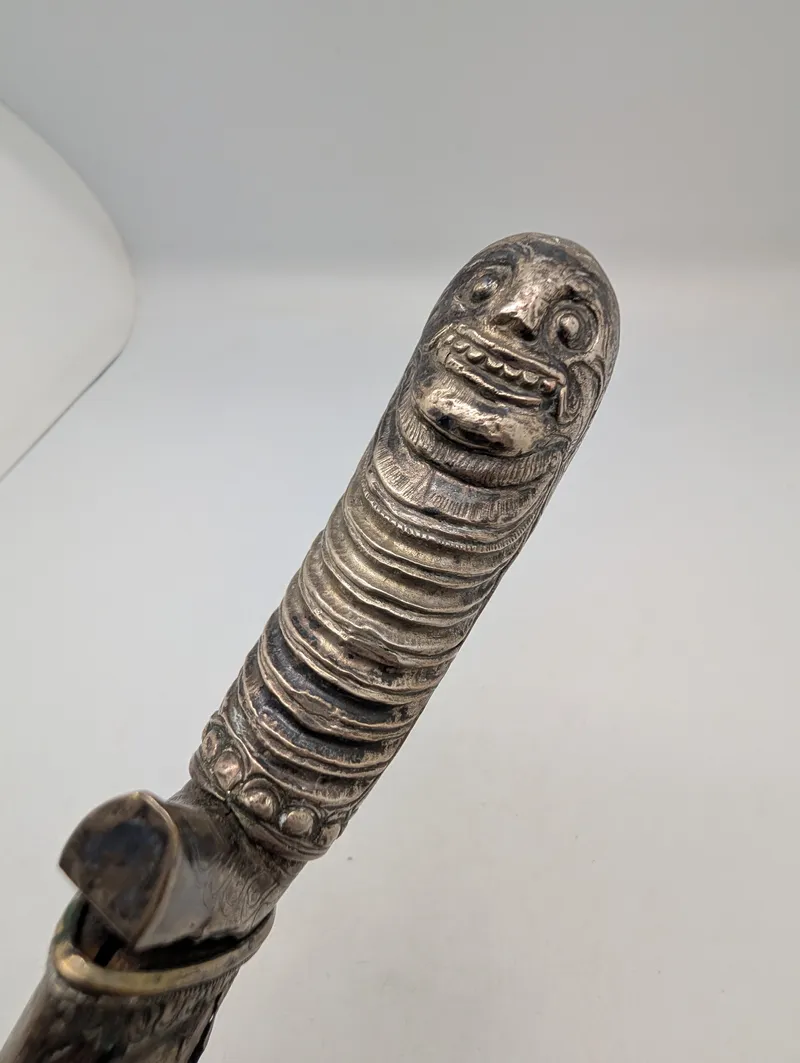 Antique Southeast Asian Silver-Toned Kris Hilt with Anthropomorphic Face