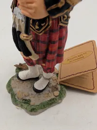 Skotsk Sækkepibespiller Figur i Traditionel Kilt