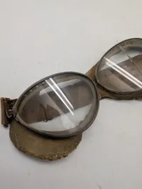 Vintage flyverbriller med læderkant og elastikrem