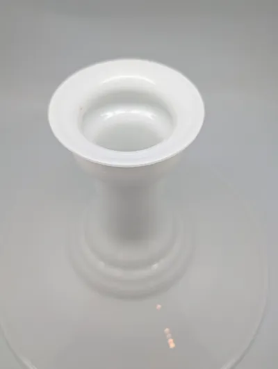 Mythos pendlen fra Holmegaard er designet af Sidse Werner. Glasskærmen er udført i opal hvid. 