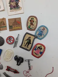 Collection of Vintage German Winterhilfswerk (WHW) Donation Tokens