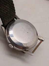 Vintage Omega armbåndsur med sølvfarvet urskive