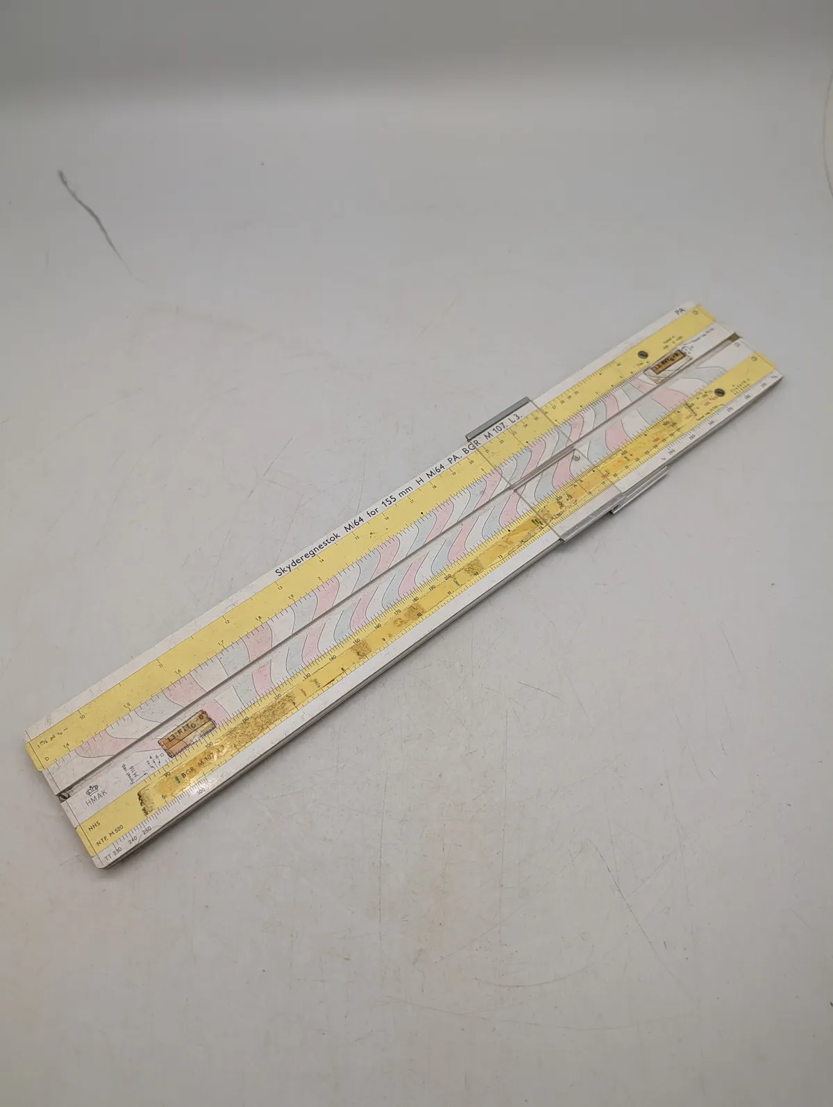 HMAK Skyderegnestok M64 til 155 mm H M164 PA. BGR M 107. L3.
