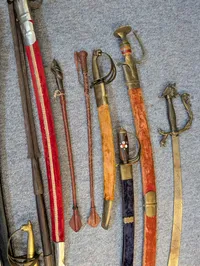 Collection of Antique and Decorative Swords, Sabers, and Daggers