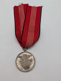 Tysk Olympisk Fortjenstmedalje 1936 med originalt bånd