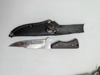 Collection of Eight Vintage Fixed Blade and Folding Knives