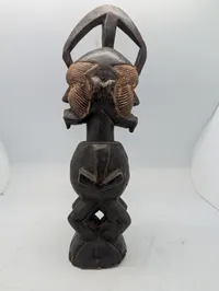West African Hand-Carved Janus-Faced Wooden Figural Sculpture