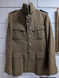 Dansk M/1923 Uniformsjakke i uld med messingknapper,  ( Omsyet 1947 uniform )